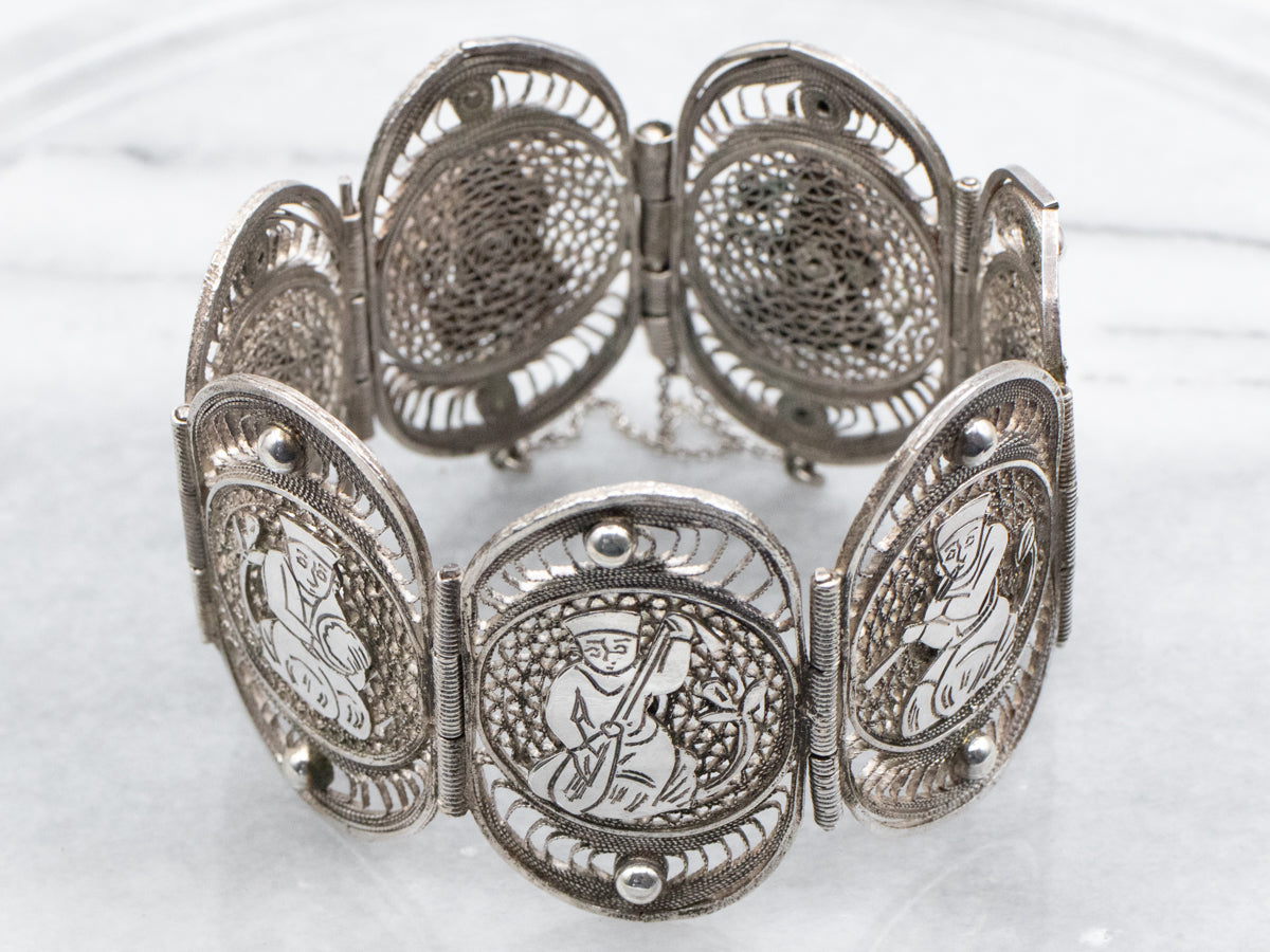 800 Silver Filigree Panel Bracelet Depicting Kneeling Figures