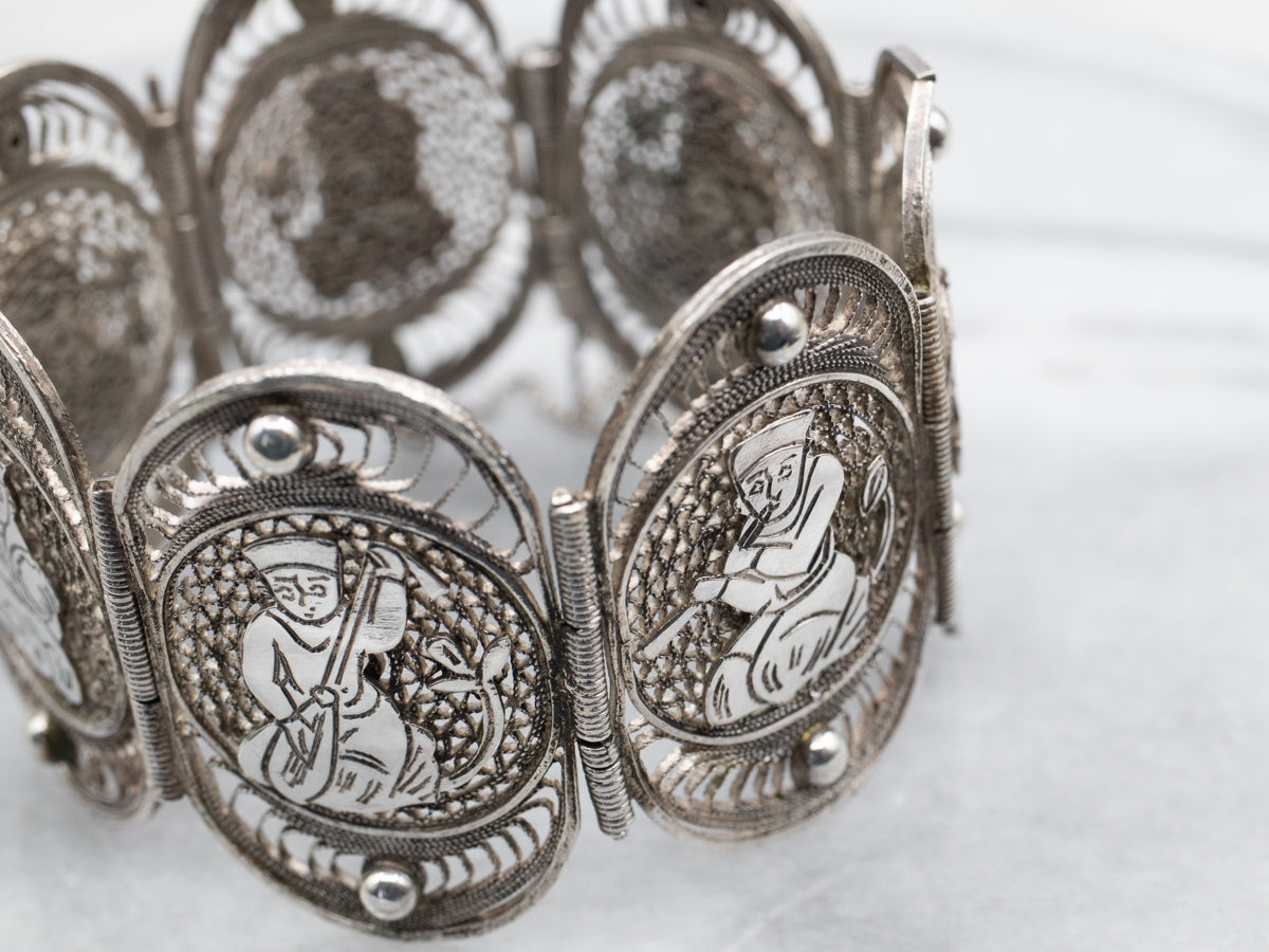 800 Silver Filigree Panel Bracelet Depicting Kneeling Figures