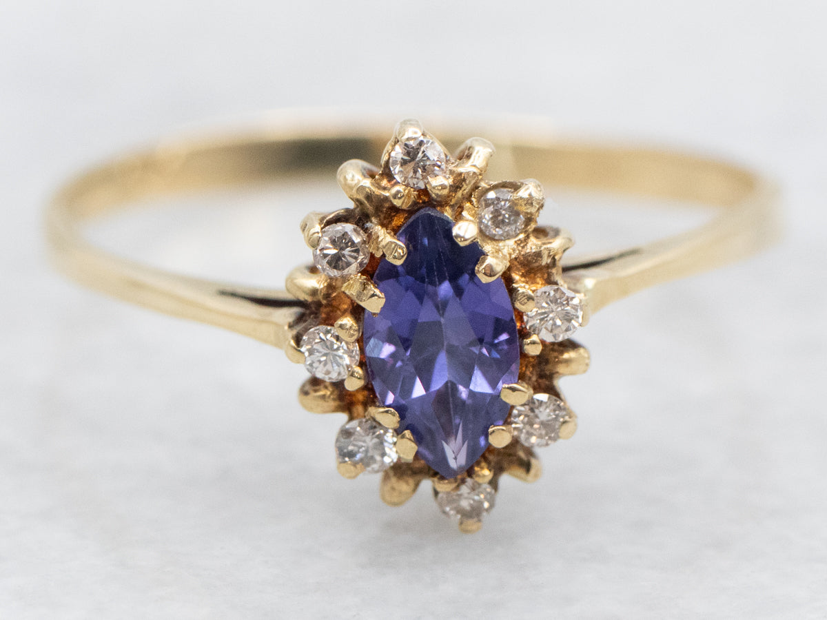 Purple Sapphire and Diamond Halo Ring