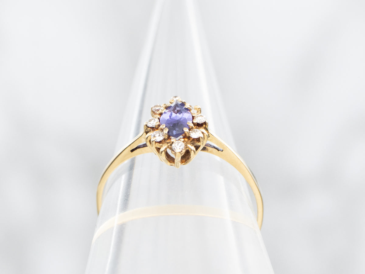 Purple Sapphire and Diamond Halo Ring