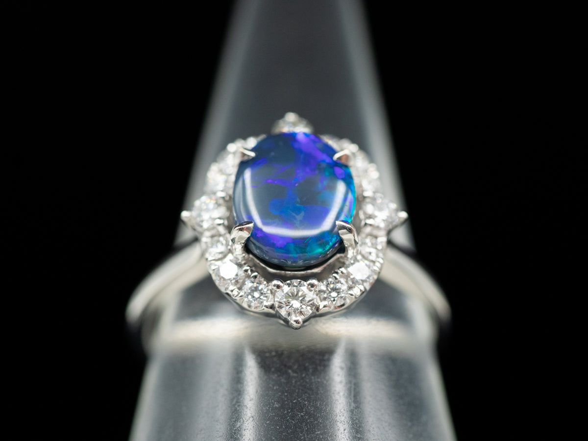 18K White Gold Black Opal Oval and Diamond Halo Ring