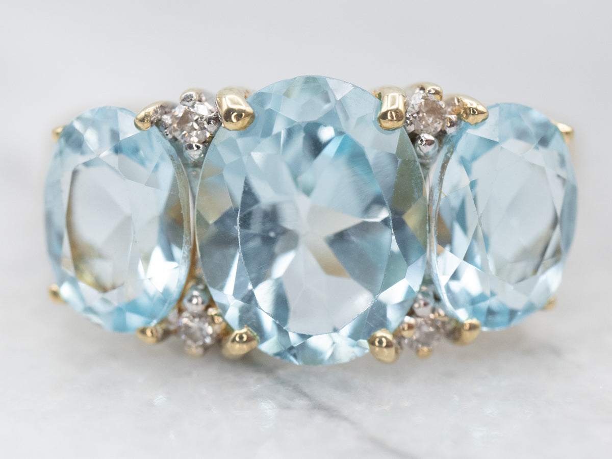 Blue Topaz Three Stone Ring with Diamond Accents