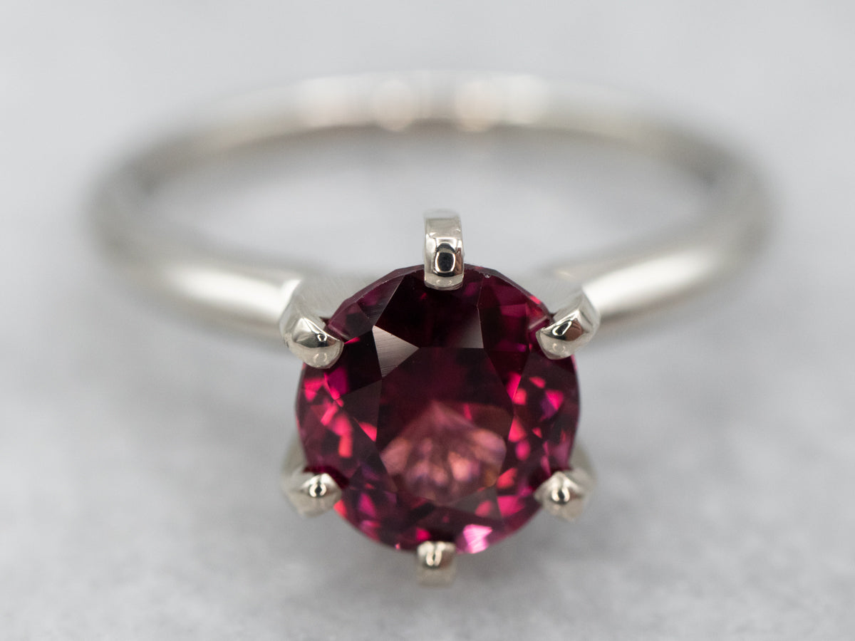 Sleek Two Tone Gold Rhodolite Garnet Solitaire Ring