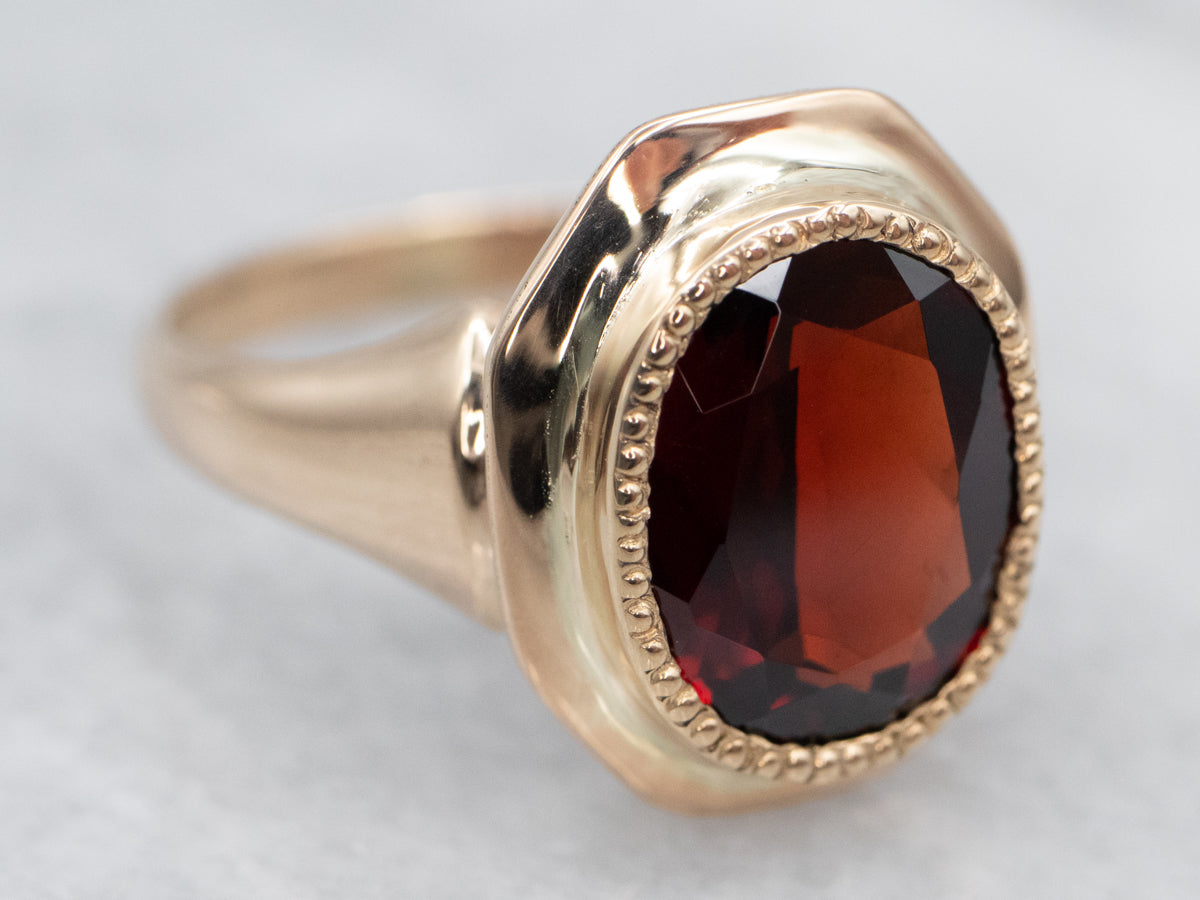 Unique Yellow Gold Garnet Bezel Set Solitaire Ring