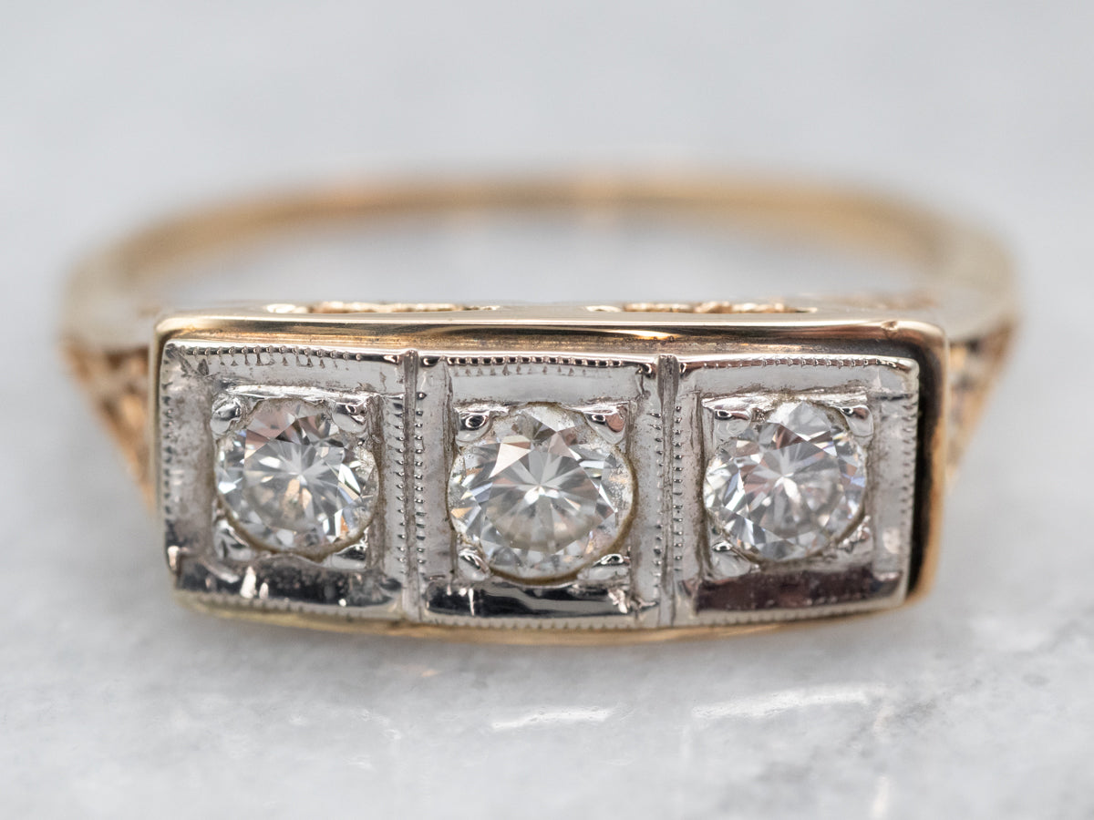 Substantial Two Tone Three Stone Diamond Ring