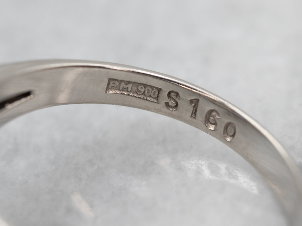 Lovely Platinum Sapphire Diamond Halo Ring