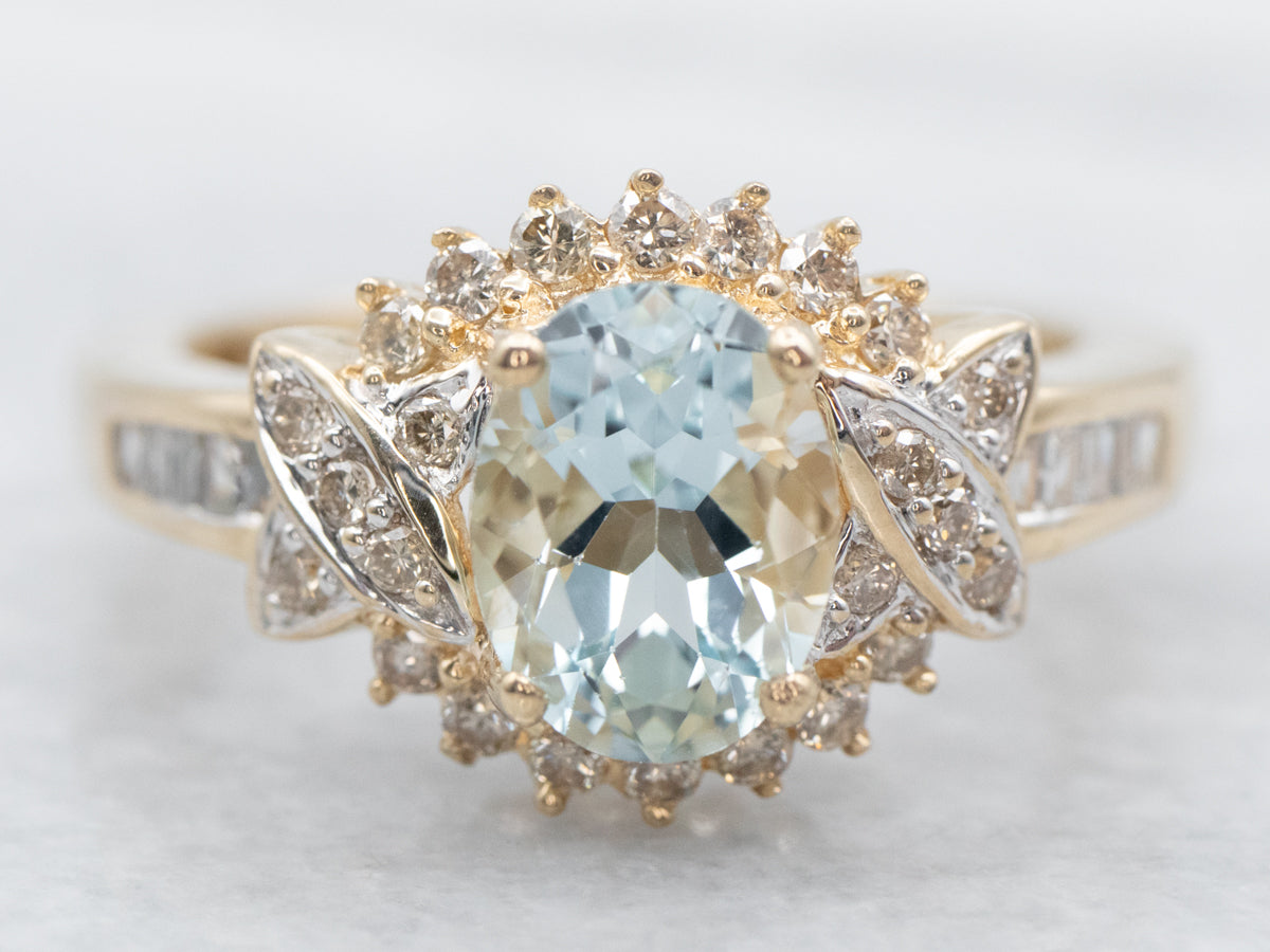 Modern Gold Aquamarine and Diamond Halo Ring