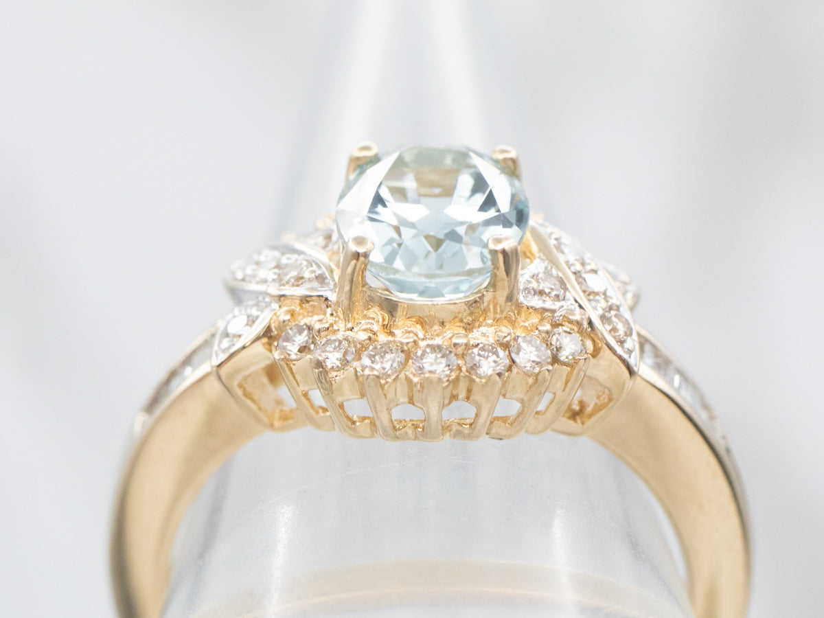 Modern Gold Aquamarine and Diamond Halo Ring