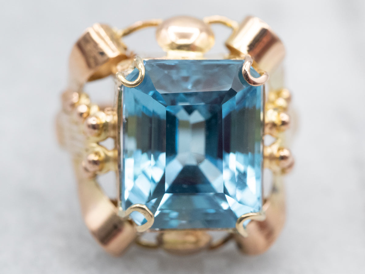 Sparkling Yellow Gold Blue Topaz Solitaire Cocktail Ring