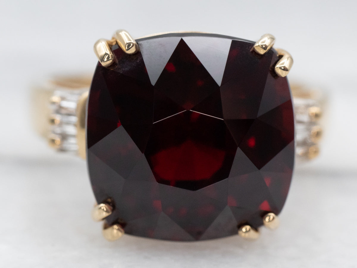 Rich Yellow Gold Garnet Cocktail Ring with Baguette Diamond Accents