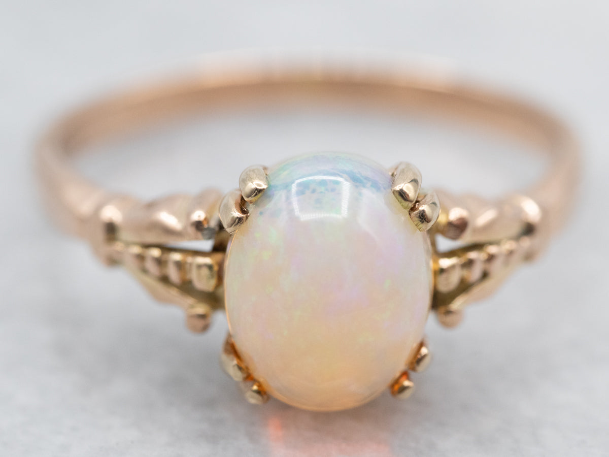 Sweet Yellow Gold Opal Solitaire Ring