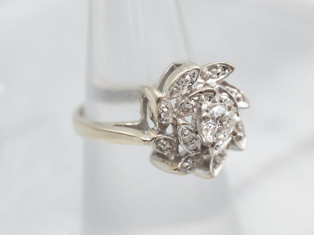 Sophisticated White Gold Diamond Pinwheel Engagement Ring