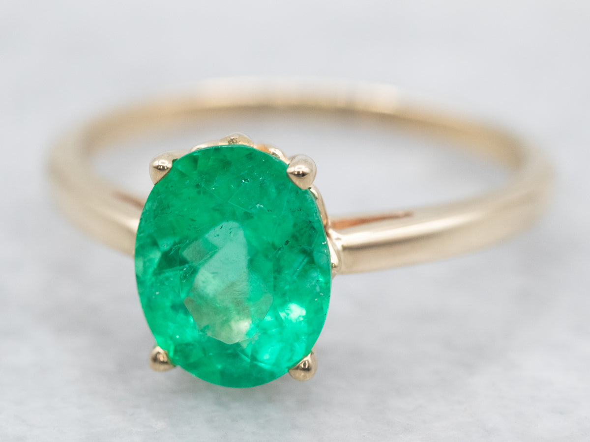 Modern Gold Emerald Solitaire Engagement Ring