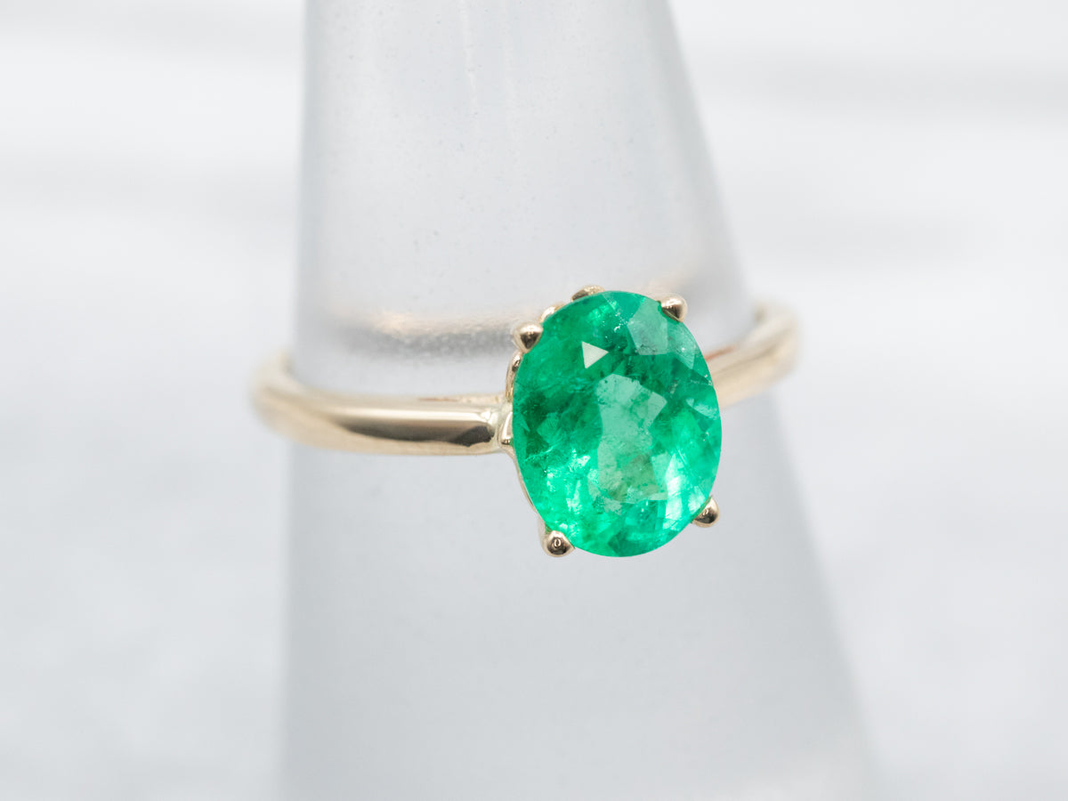 Modern Gold Emerald Solitaire Engagement Ring