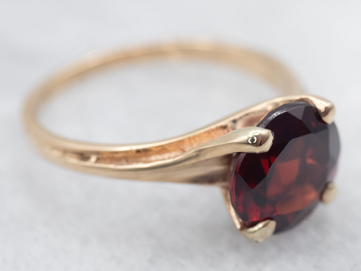 Yellow Gold Garnet Solitaire Bypass Ring