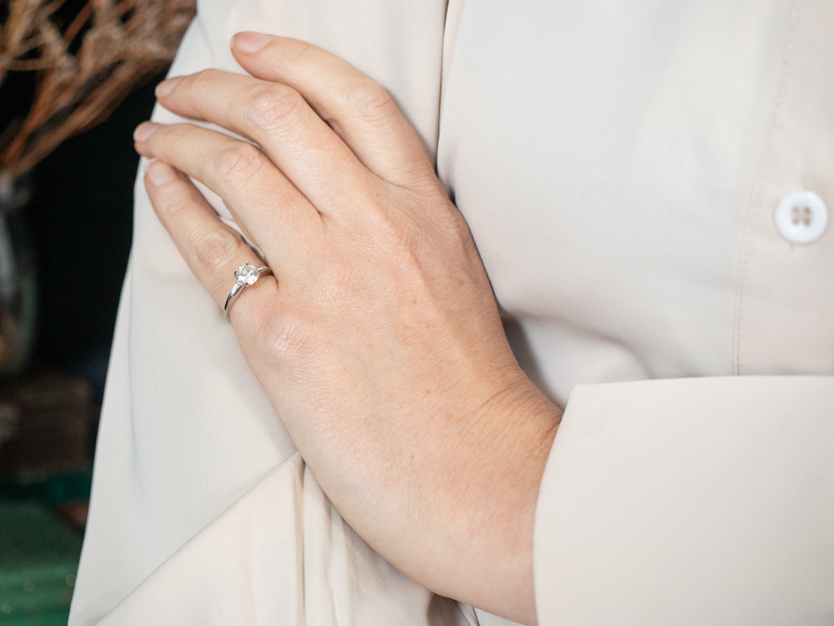 Platinum Diamond Engagement Ring with Baguette Diamond Accents