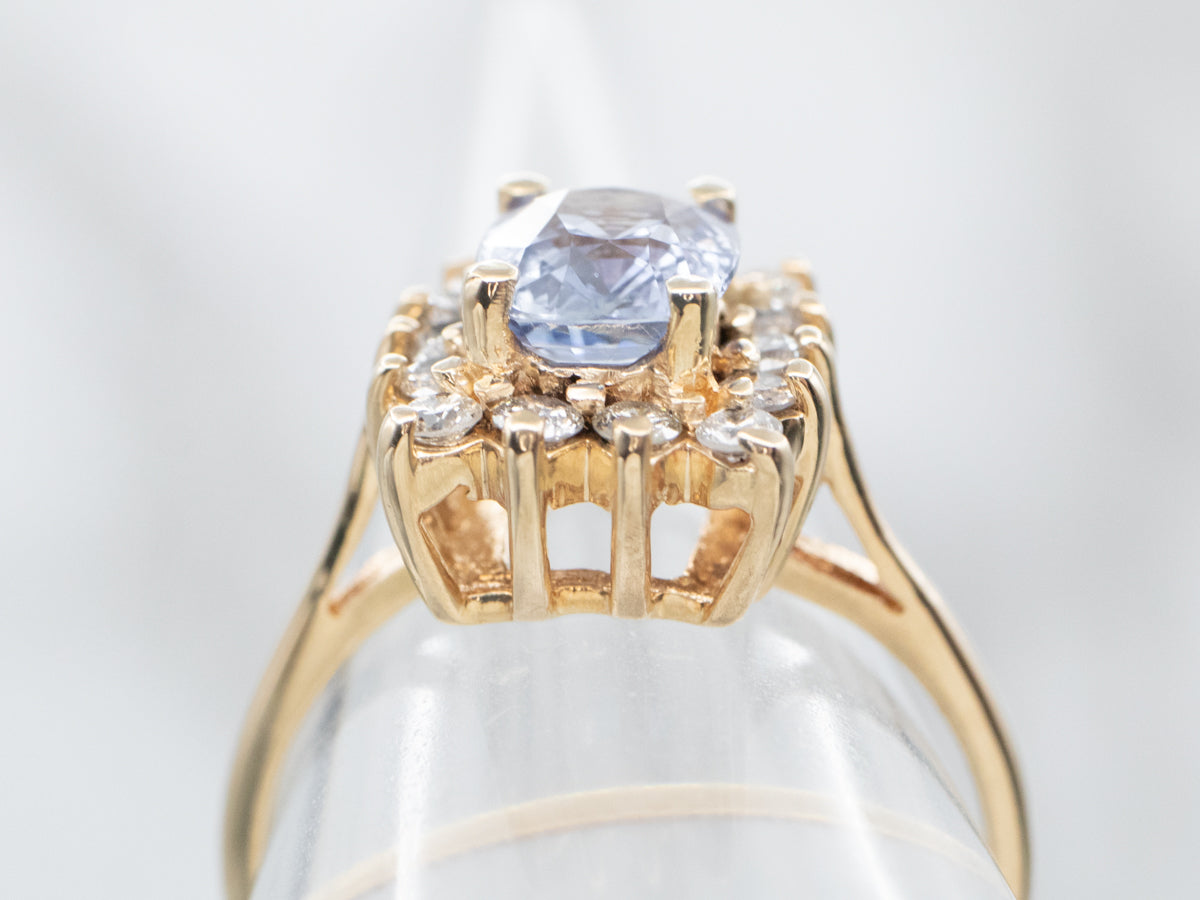Yellow Gold Sapphire Engagement Ring with Diamond Halo
