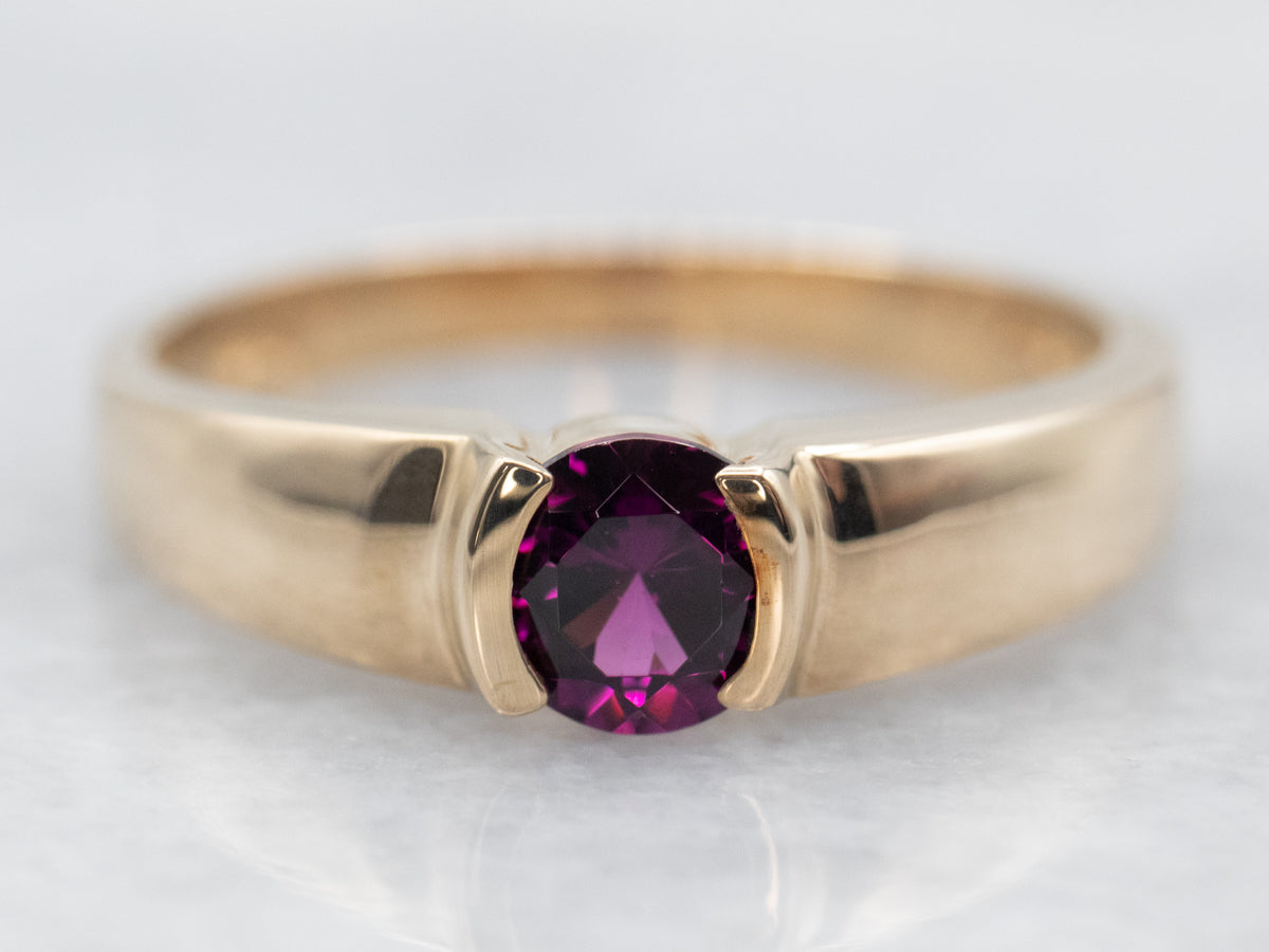 Yellow Gold Tension Set Garnet Solitaire Ring