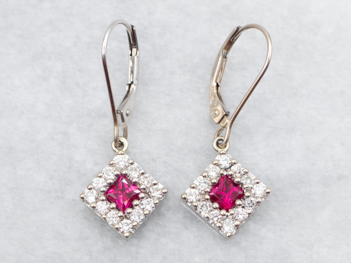 Bonitos aretes colgantes con halo de diamantes y rubíes