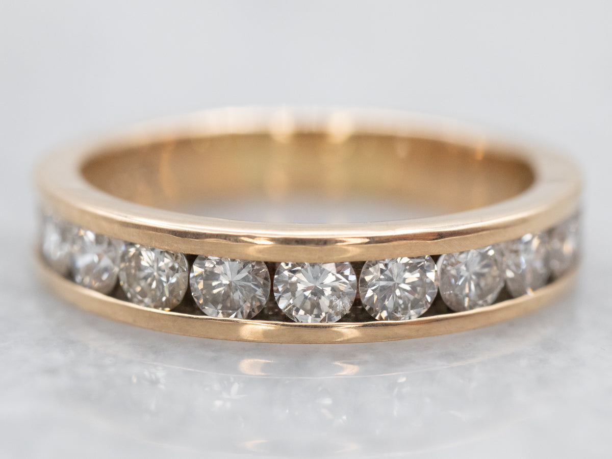 Exquisite Yellow Gold Channel Set Diamond Wedding Band