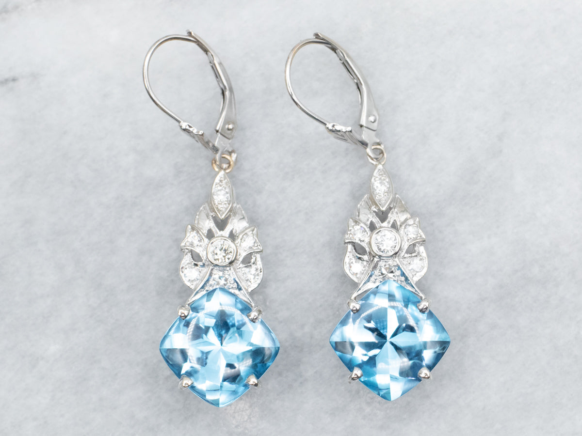 Pendientes colgantes de topacio azul y diamantes