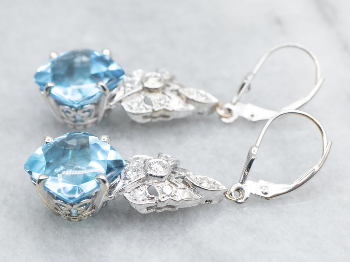 Pendientes colgantes de topacio azul y diamantes