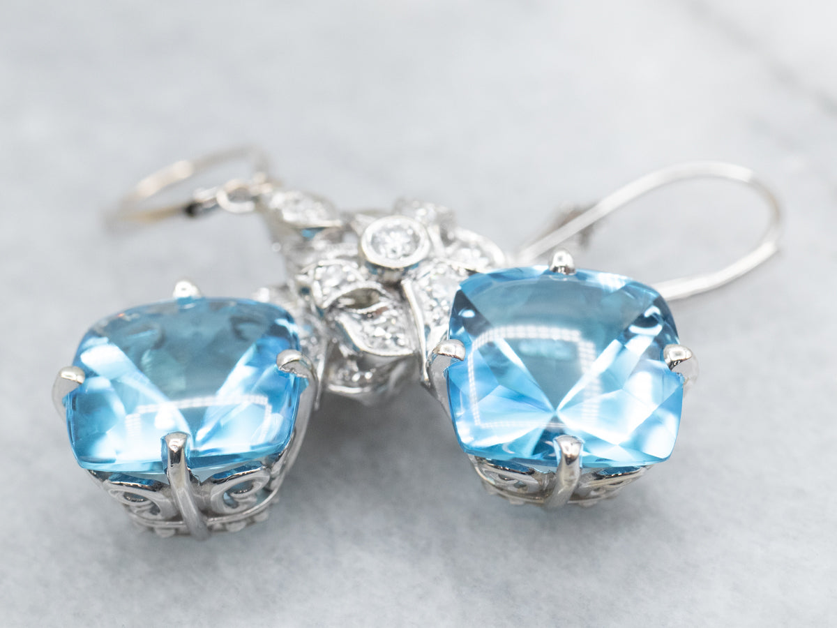 Pendientes colgantes de topacio azul y diamantes