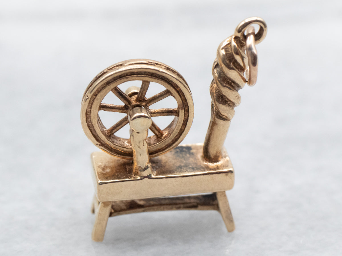 Sleeping Beauty's Gold Spinning Wheel Charm