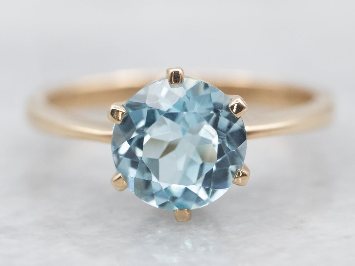 Yellow Gold Blue Topaz Solitaire Ring