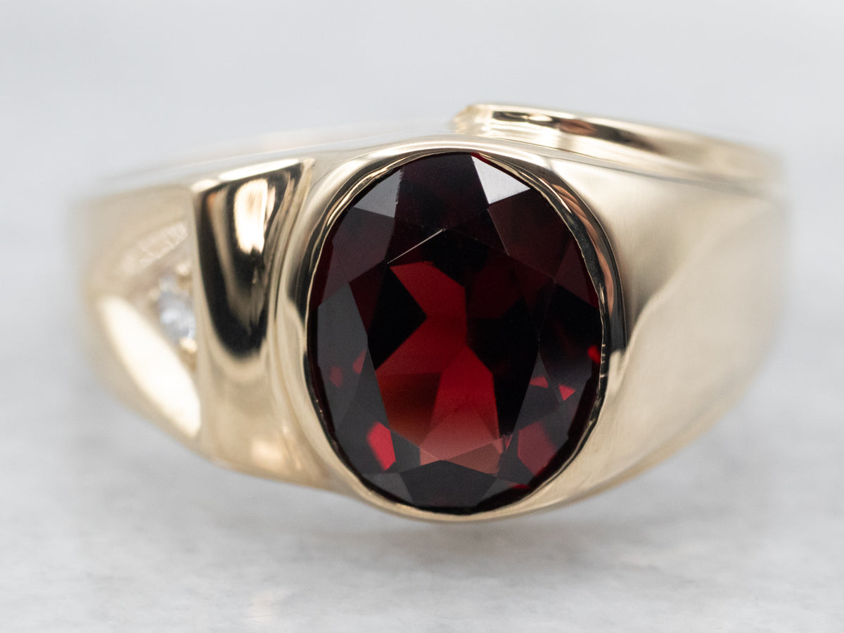 Yellow Gold Bezel Set Oval Cut Pyrope Garnet Ring with Diamond Accent