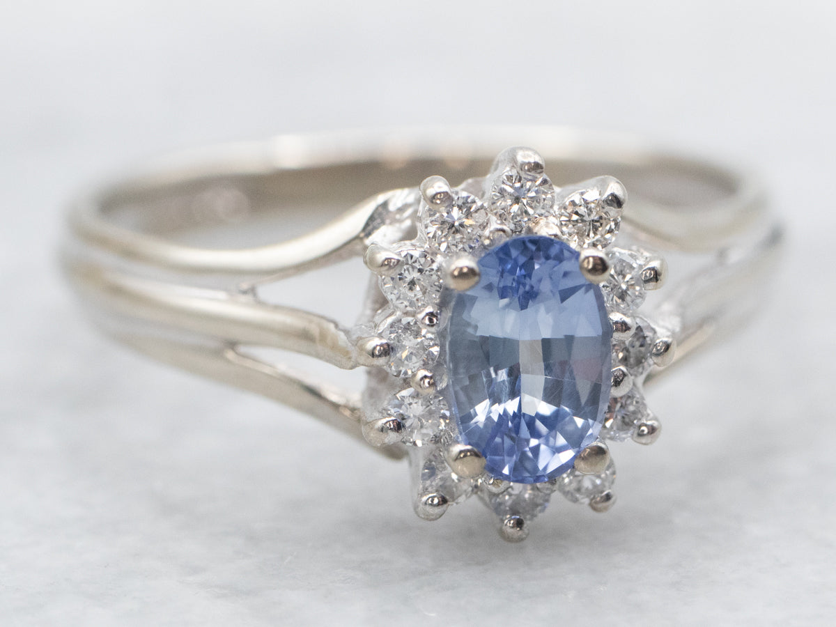 White Gold Oval Cut Sapphire Engagement Ring with Diamond Halo