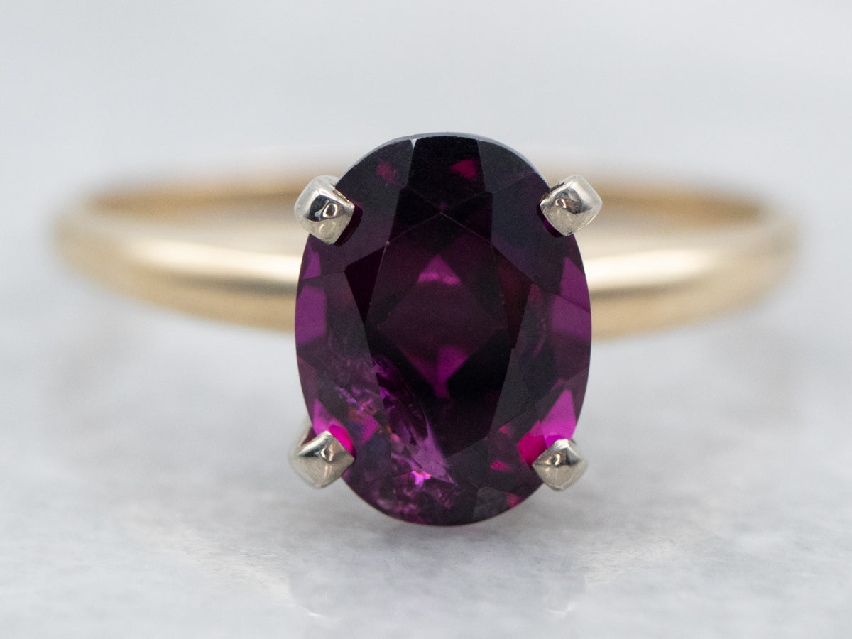 Two Tone Oval Cut Rhodolite Garnet Solitaire Ring