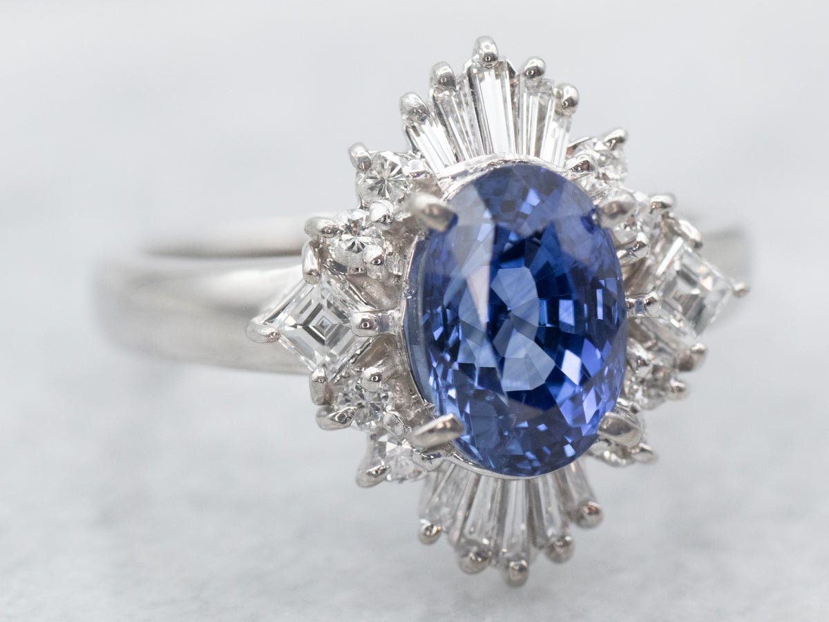Platinum Oval Cut Sapphire Engagement Ring with Round and Baguette Cut