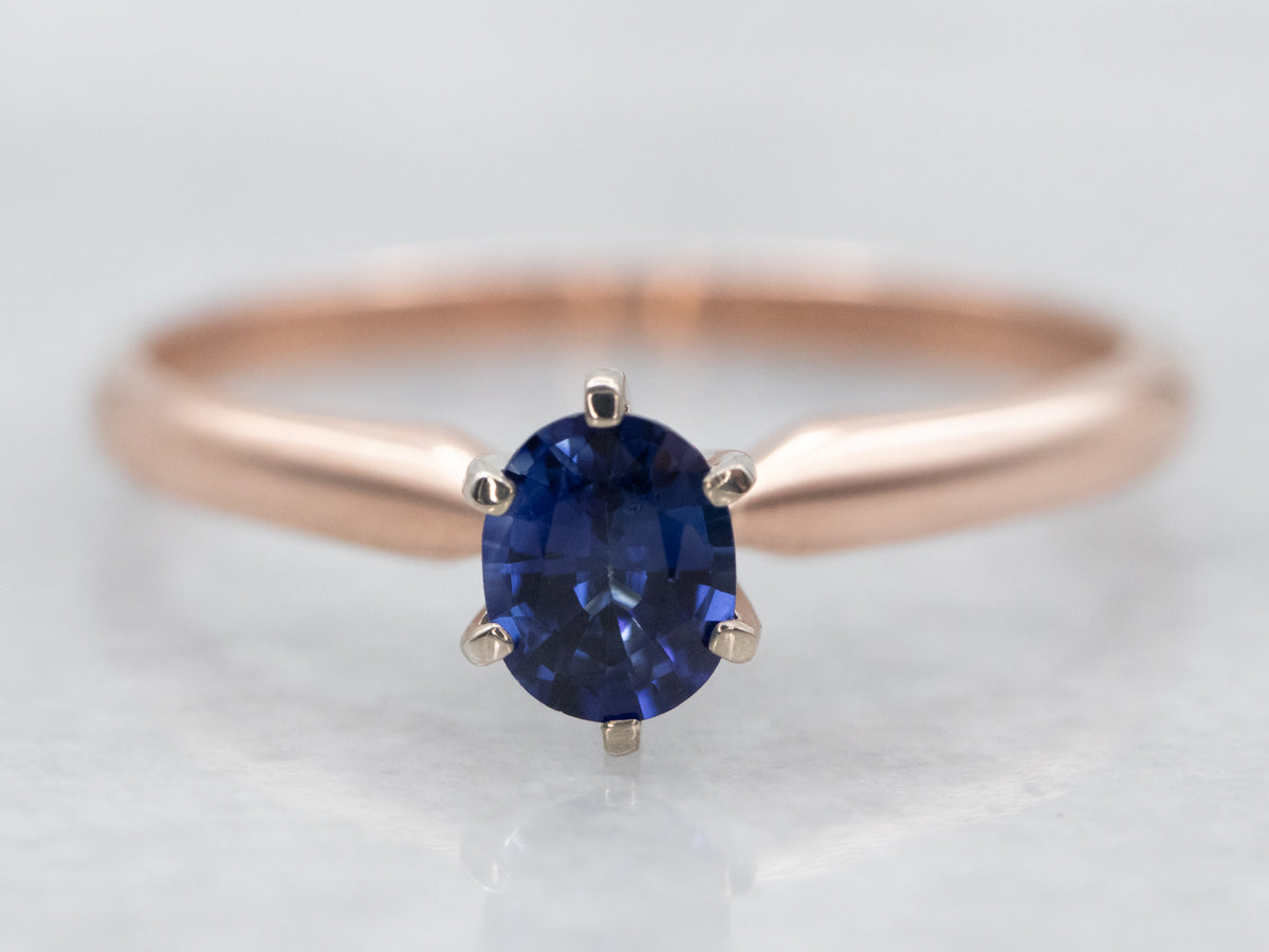 Two Tone Oval Cut Sapphire Solitaire Engagement Ring