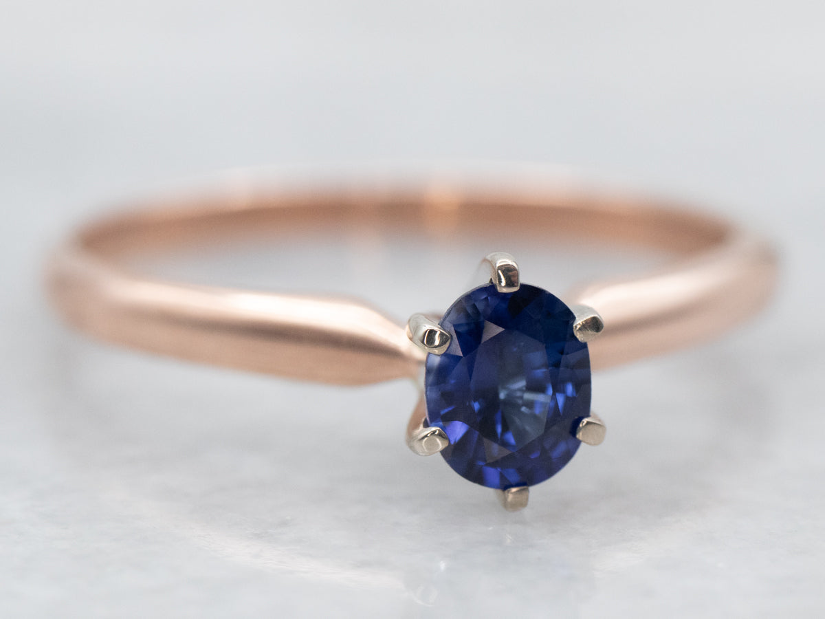 Two Tone Oval Cut Sapphire Solitaire Engagement Ring