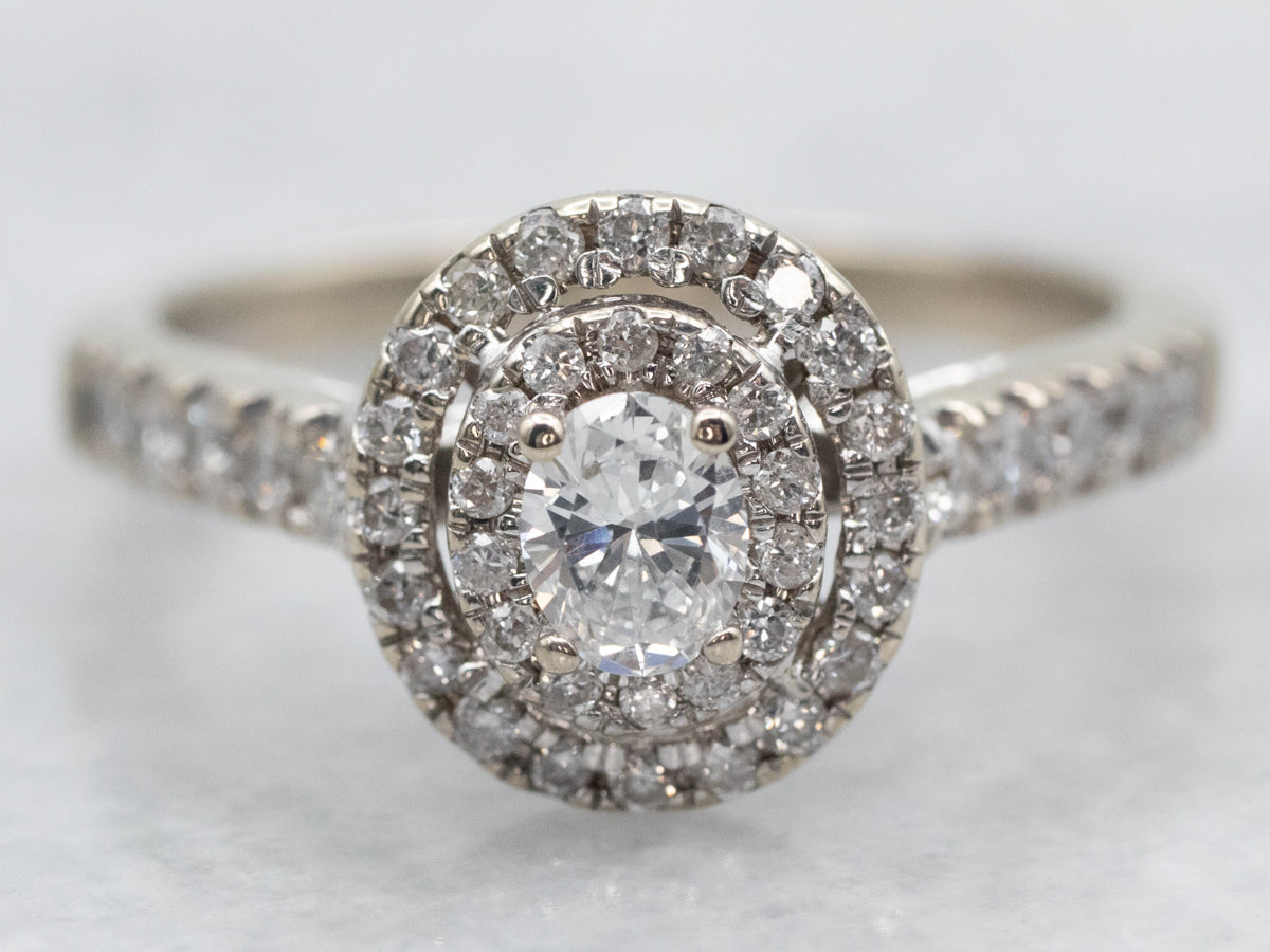 Modern Oval Cut Diamond Engagement Ring with Double Diamond Halo