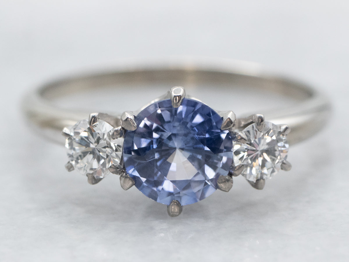 White Gold Round Cut Sapphire Engagement Ring with Diamond Accents