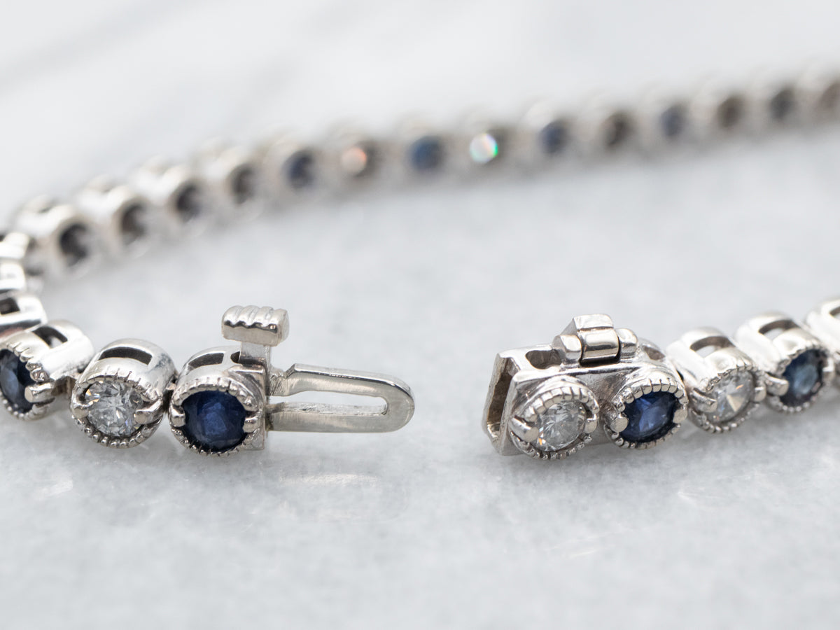 White Gold Round Cut Diamond and Sapphire Tennis Bracelet with Box Cla