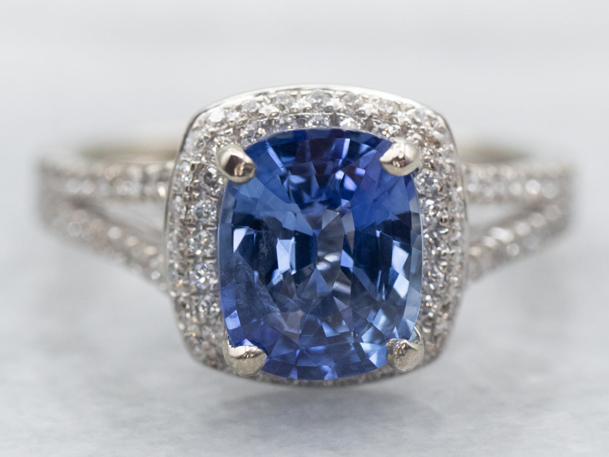 Modern Cushion Cut Sapphire Engagement Ring with Diamond Halo