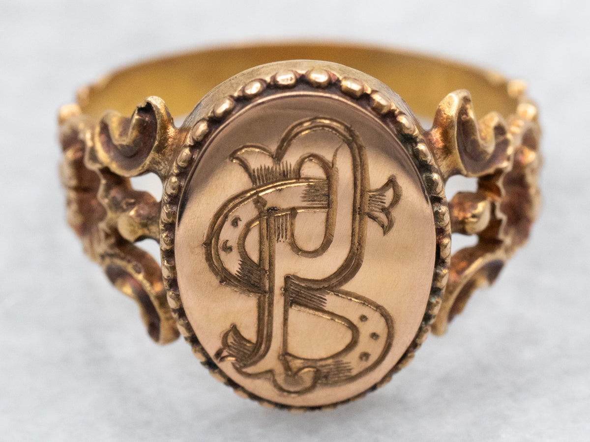 Anillo de sello grabado &quot;PS&quot; en oro 800 con hombros adornados