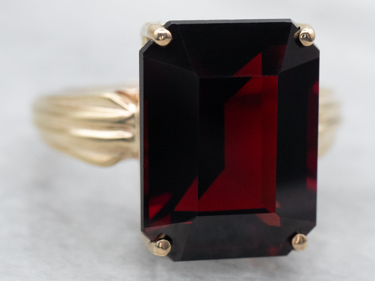 Emerald Cut Garnet Solitaire Ring