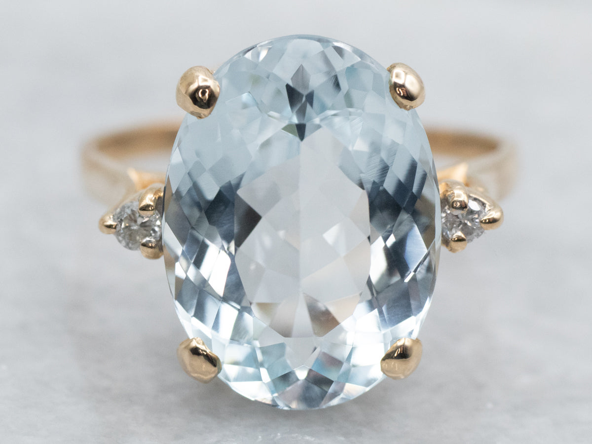 Blue Topaz Ring with Diamond Accents