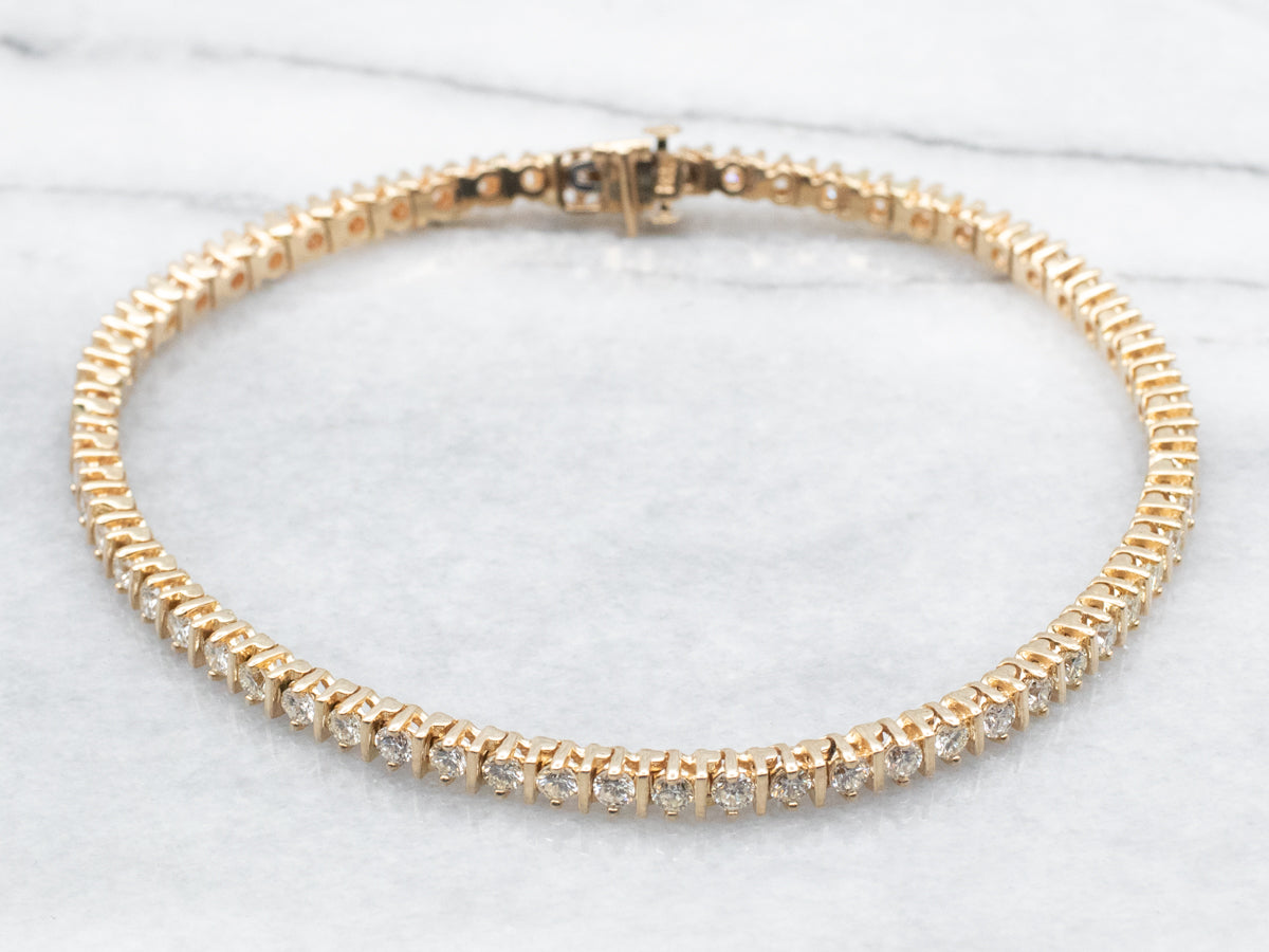 Pulsera de tenis clásica de oro y diamantes