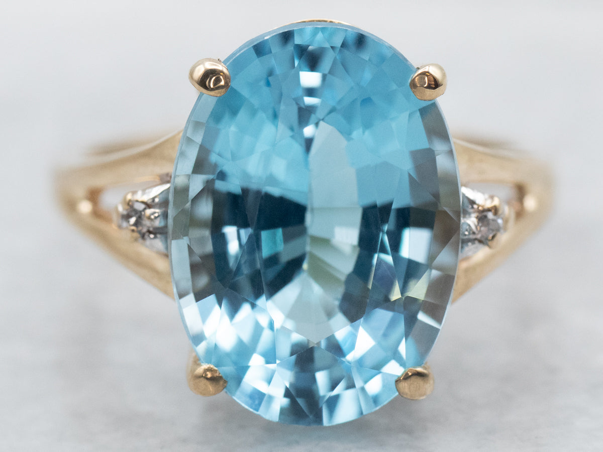 Gold Blue Topaz and Diamond Ring