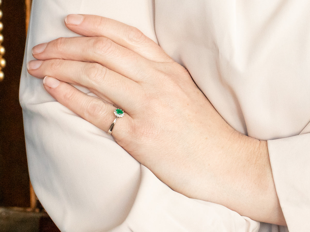 Modern Emerald and Diamond Halo Ring