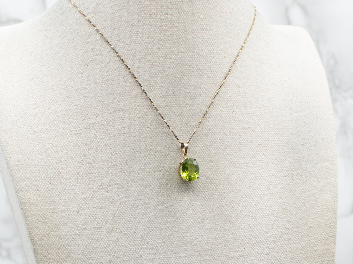 Oval Cut Peridot Solitaire Pendant