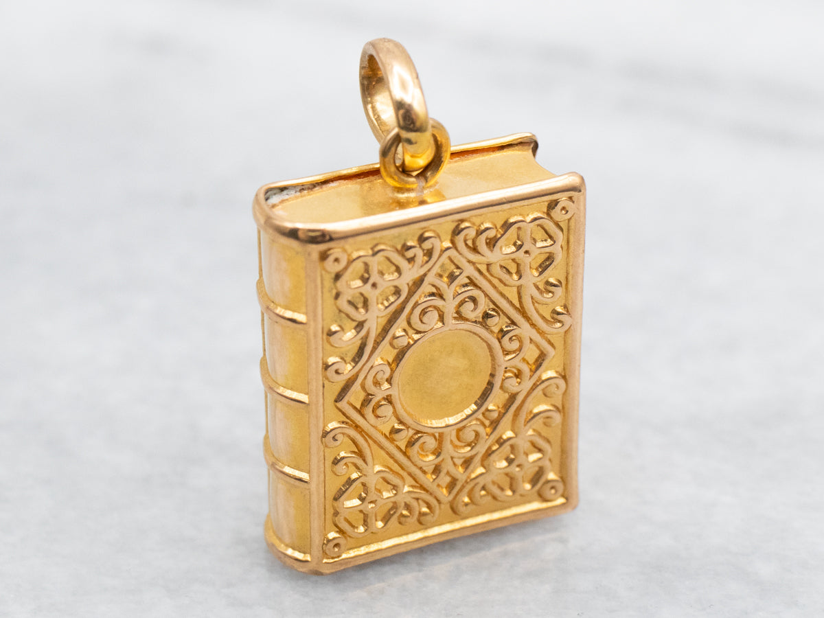 Ornate 21-Karat Gold Book Pendant