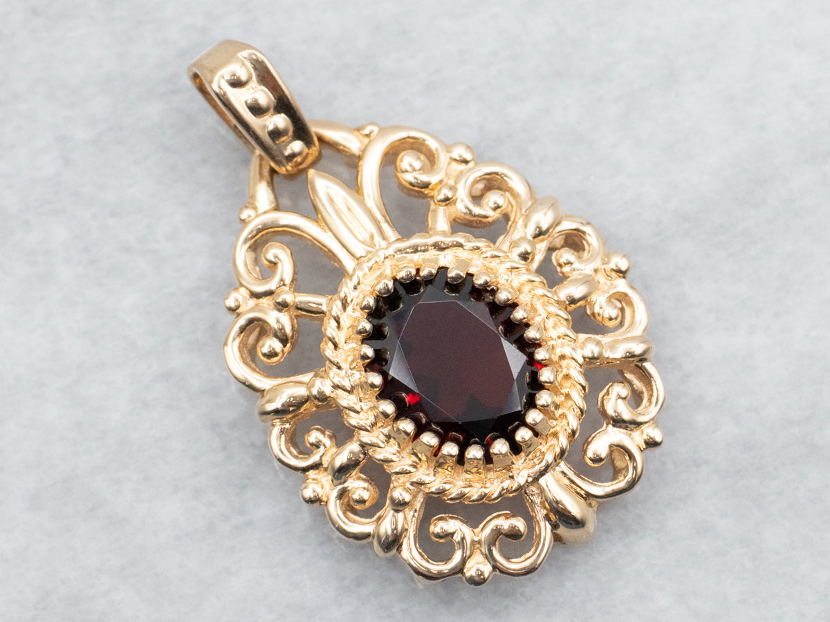 Garnet Pendant with Scrolling Frame