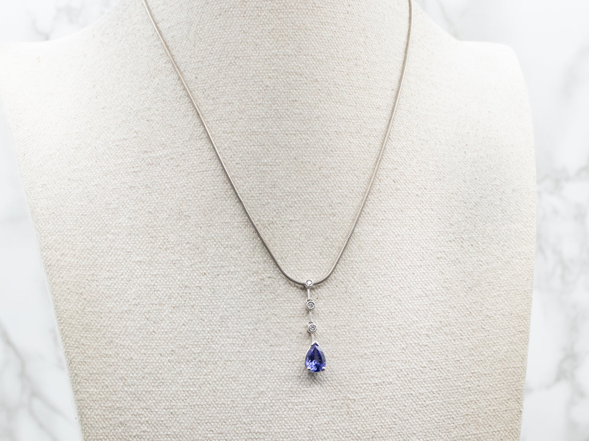 Modern Tanzanite and Diamond Pendant