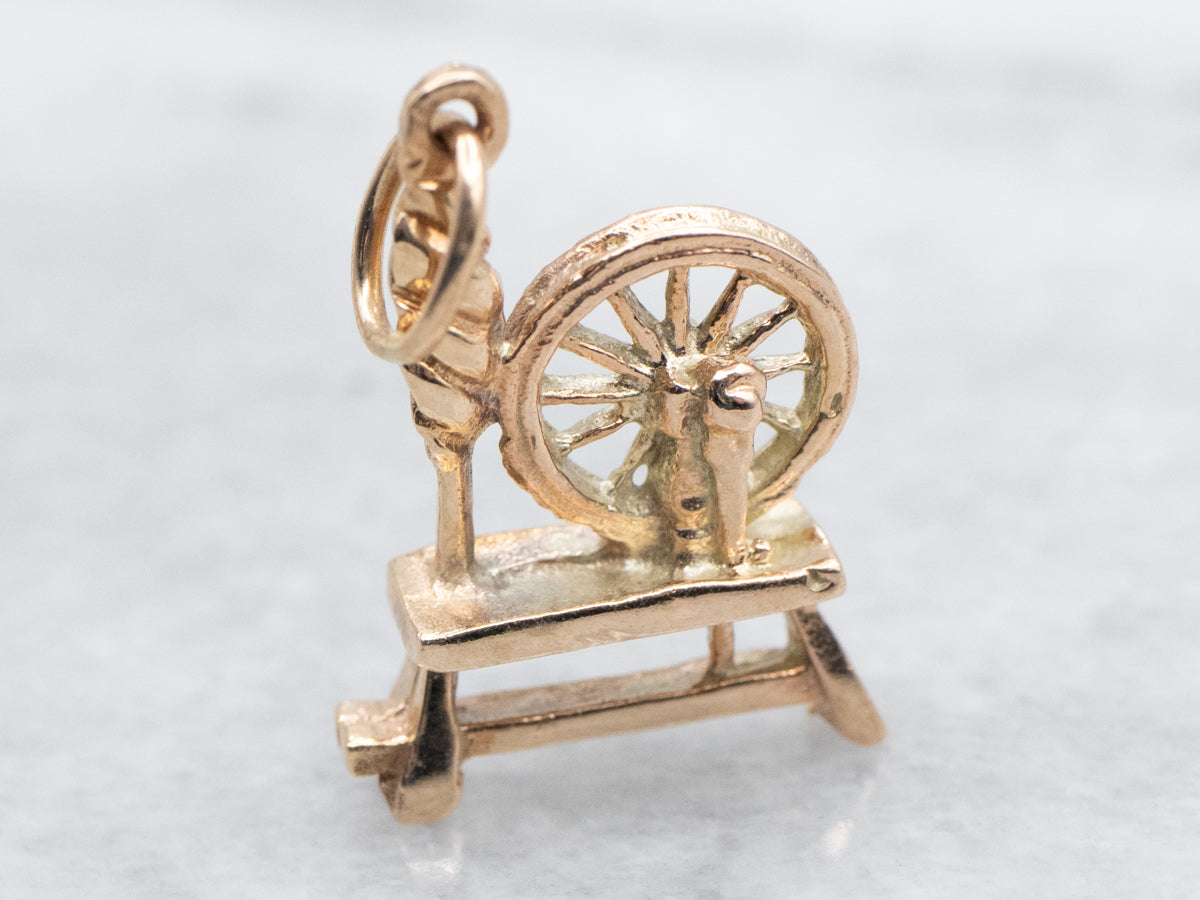 Spinning Wheel Charm